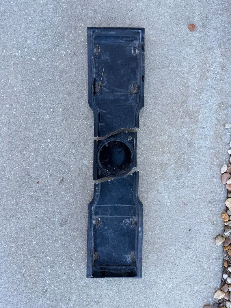 The broken mailbox bracket welded back into one piece