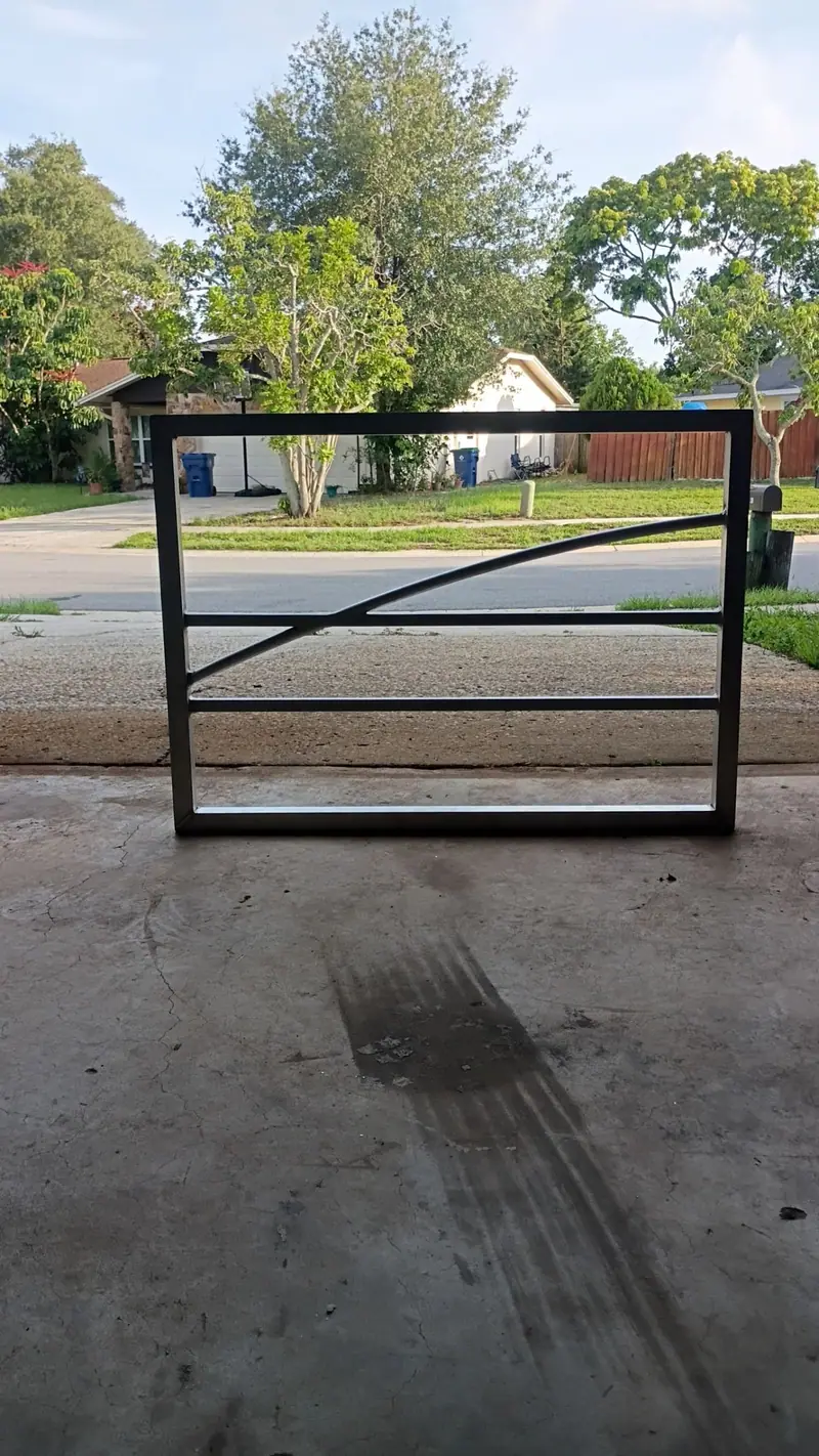 Custom pontoon rail panel frame welded up in a driveway